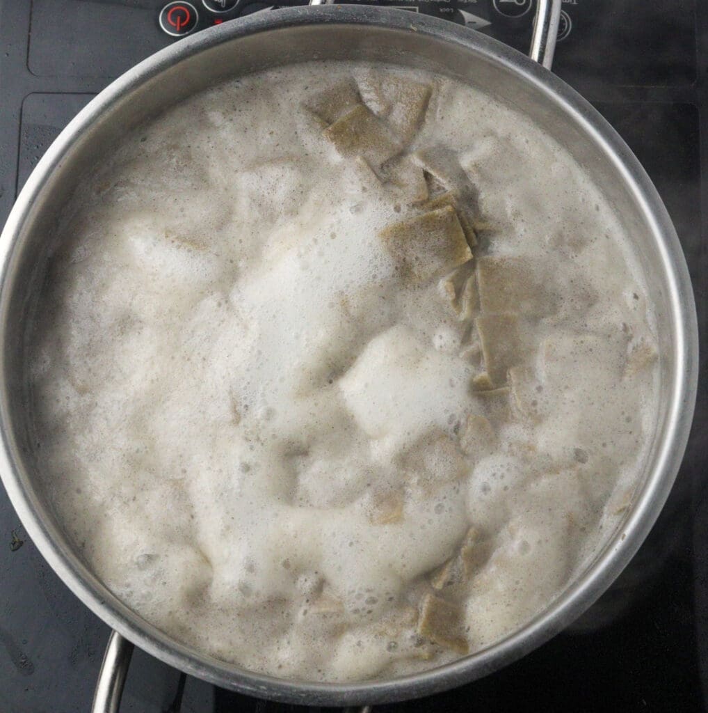 image of lazanki noodles in a pot of boiling water
